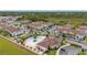 Aerial view of community with pool, parking and townhomes at 8984 Silver Pl, Kissimmee, FL 34747