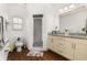 Bathroom with double vanity, shower, and Toy Story decor at 8984 Silver Pl, Kissimmee, FL 34747