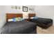 Simpsons themed bedroom with twin beds and wall art at 8984 Silver Pl, Kissimmee, FL 34747