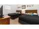 Simpsons themed bedroom with twin beds and a TV at 8984 Silver Pl, Kissimmee, FL 34747