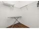 Closet with ironing board and wire shelving at 8984 Silver Pl, Kissimmee, FL 34747