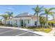 Community clubhouse with inviting front porch and landscaping at 8984 Silver Pl, Kissimmee, FL 34747