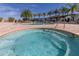 Inviting hot tub with surrounding patio at 8984 Silver Pl, Kissimmee, FL 34747