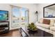 Living room with patio access, a comfy couch, and a flat-screen TV at 8984 Silver Pl, Kissimmee, FL 34747