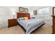 Spacious main bedroom with king-size bed, nightstands, and ample natural light at 8984 Silver Pl, Kissimmee, FL 34747