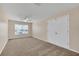 Spacious bedroom featuring a double door closet and window at 1020 Golf Course Pkwy, Davenport, FL 33837