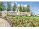 Ridgewood Lakes community entrance with a sign and landscaping at 1020 Golf Course Pkwy, Davenport, FL 33837