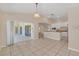 Spacious dining area with access to patio and kitchen at 1020 Golf Course Pkwy, Davenport, FL 33837