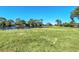 Lush green golf course with a tranquil water feature at 1020 Golf Course Pkwy, Davenport, FL 33837