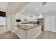Kitchen with white cabinets, stainless steel appliances, and an island at 1020 Golf Course Pkwy, Davenport, FL 33837