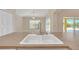 Kitchen sink with double basin and modern faucet, overlooking pool at 1020 Golf Course Pkwy, Davenport, FL 33837