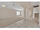 Bright living room with high ceilings and neutral tones at 1020 Golf Course Pkwy, Davenport, FL 33837