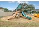 play area with two slides and sandbox at 1020 Golf Course Pkwy, Davenport, FL 33837