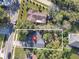 Aerial view of a residential property, pinpointing its location within a neighborhood at 1234 Lynwood Ave, Apopka, FL 32703