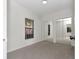 Bedroom with mirrored closet doors, carpeted flooring, and a window with blinds at 1234 Lynwood Ave, Apopka, FL 32703