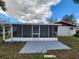 Backyard patio and screened-in porch at 1427 Wilton Ave, Orlando, FL 32805
