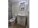 Bathroom with shower, vanity, and toilet at 1427 Wilton Ave, Orlando, FL 32805