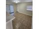 Dining area with tile flooring and sliding glass doors at 1427 Wilton Ave, Orlando, FL 32805