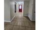 Entryway with tile flooring and a red front door at 1427 Wilton Ave, Orlando, FL 32805