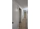 Hallway with tiled flooring and doors leading to other rooms at 1427 Wilton Ave, Orlando, FL 32805