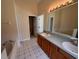 Double vanity bathroom with a garden tub and separate shower at 16718 Fresh Meadow Dr, Clermont, FL 34714