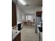 Open kitchen and dining area with access to living space at 2528 Chatham Cir, Kissimmee, FL 34746