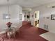 Open concept dining area leading to living room and kitchen at 2528 Chatham Cir, Kissimmee, FL 34746