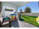 Fenced backyard with a paved patio area, playset, and trampoline at 3896 Grassland Dr, Orlando, FL 32824