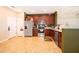 Well-appointed kitchen featuring stainless steel appliances, ample counter space, and wood cabinetry at 3896 Grassland Dr, Orlando, FL 32824
