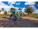 Community playground with green and purple slides and climbing structures at 3896 Grassland Dr, Orlando, FL 32824