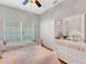 Charming bedroom featuring twin beds, ample storage, and playful decor at 411 Ridge View Dr, Davenport, FL 33837