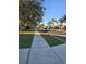 Residential street lined with homes and palm trees at 4240 Settlers Ct, Saint Cloud, FL 34772