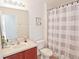 Clean bathroom with shower/tub combo and updated vanity at 4577 Alberto Cir, Kissimmee, FL 34746