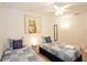 Guest bedroom with two twin beds and patterned bedding at 4577 Alberto Cir, Kissimmee, FL 34746