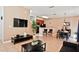 Open living area with kitchen, breakfast bar, and dining area at 4577 Alberto Cir, Kissimmee, FL 34746