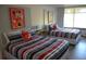 Bedroom with two double beds and Mickey Mouse decor at 5245 W Irlo Bronson Memorial Hwy # 115, Kissimmee, FL 34746