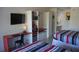 Bedroom with two double beds and a kitchenette at 5245 W Irlo Bronson Memorial Hwy # 115, Kissimmee, FL 34746