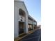 Two-story building with balconies and ample parking at 5245 W Irlo Bronson Memorial Hwy # 115, Kissimmee, FL 34746