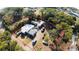 Aerial view of a single story home on a large lot with RV and vehicles at 721 Langston Ave, Haines City, FL 33844