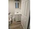 Simple bathroom with vanity and wood-look floors at 721 Langston Ave, Haines City, FL 33844