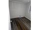 Bright bedroom with new flooring, window, and closet at 721 Langston Ave, Haines City, FL 33844