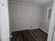Spacious bedroom with new flooring and a window at 721 Langston Ave, Haines City, FL 33844