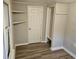 Cozy bedroom with wood-look floors and built-in shelves at 721 Langston Ave, Haines City, FL 33844