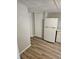 Kitchen features white cabinets and refrigerator at 721 Langston Ave, Haines City, FL 33844
