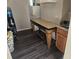 Small kitchen with new flooring and a kitchen island at 721 Langston Ave, Haines City, FL 33844