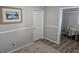 Living room features wood-look floors and a neutral color palette at 721 Langston Ave, Haines City, FL 33844