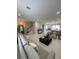 Open and spacious living room with large windows and stylish furnishings at 8919 Lakeshore Pointe Dr, Winter Garden, FL 34787