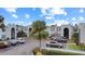 A higher vantage point of the community, featuring parking and lush greenery at 1006 Plantation Dr # F12, Kissimmee, FL 34741