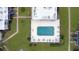 Community pool with turquoise water at 1006 Plantation Dr # F12, Kissimmee, FL 34741