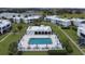 Inviting community pool area with ample seating and lush landscaping at 1006 Plantation Dr # F12, Kissimmee, FL 34741